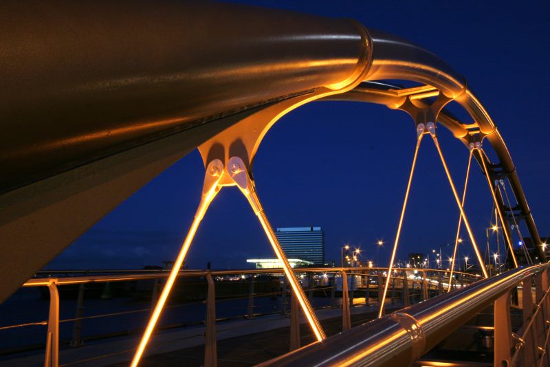 A bridge lit up at night